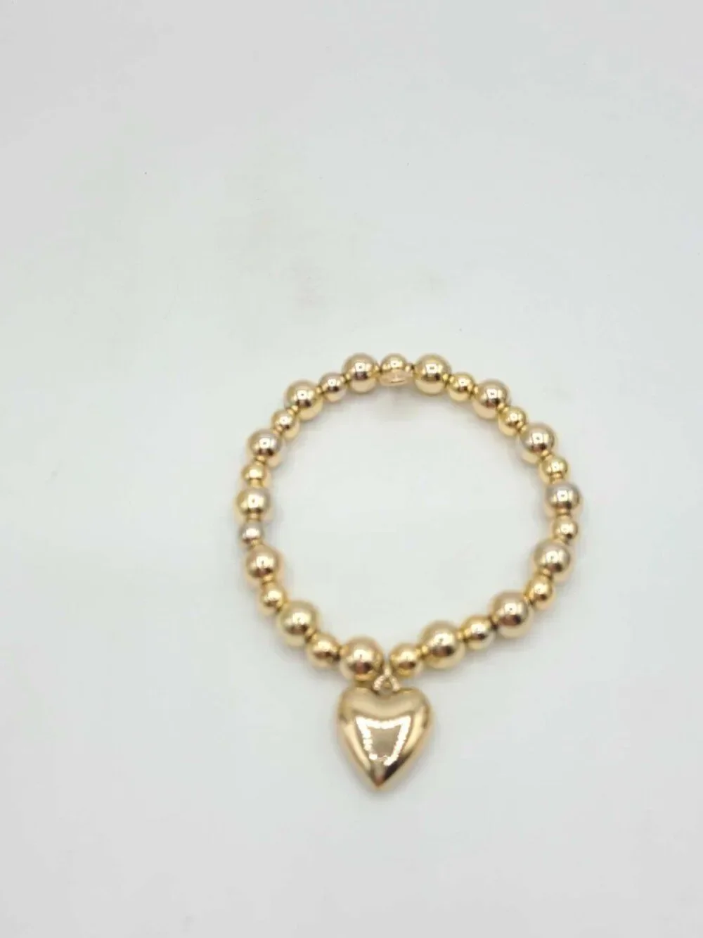 J Crew Stretchy Gold Tone Beaded Bracelet with Heart NWOT
